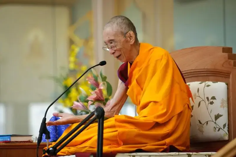Buddhist master Ven Geshe Kelsang Gyatso teaching dharma at a Kadamap Festival